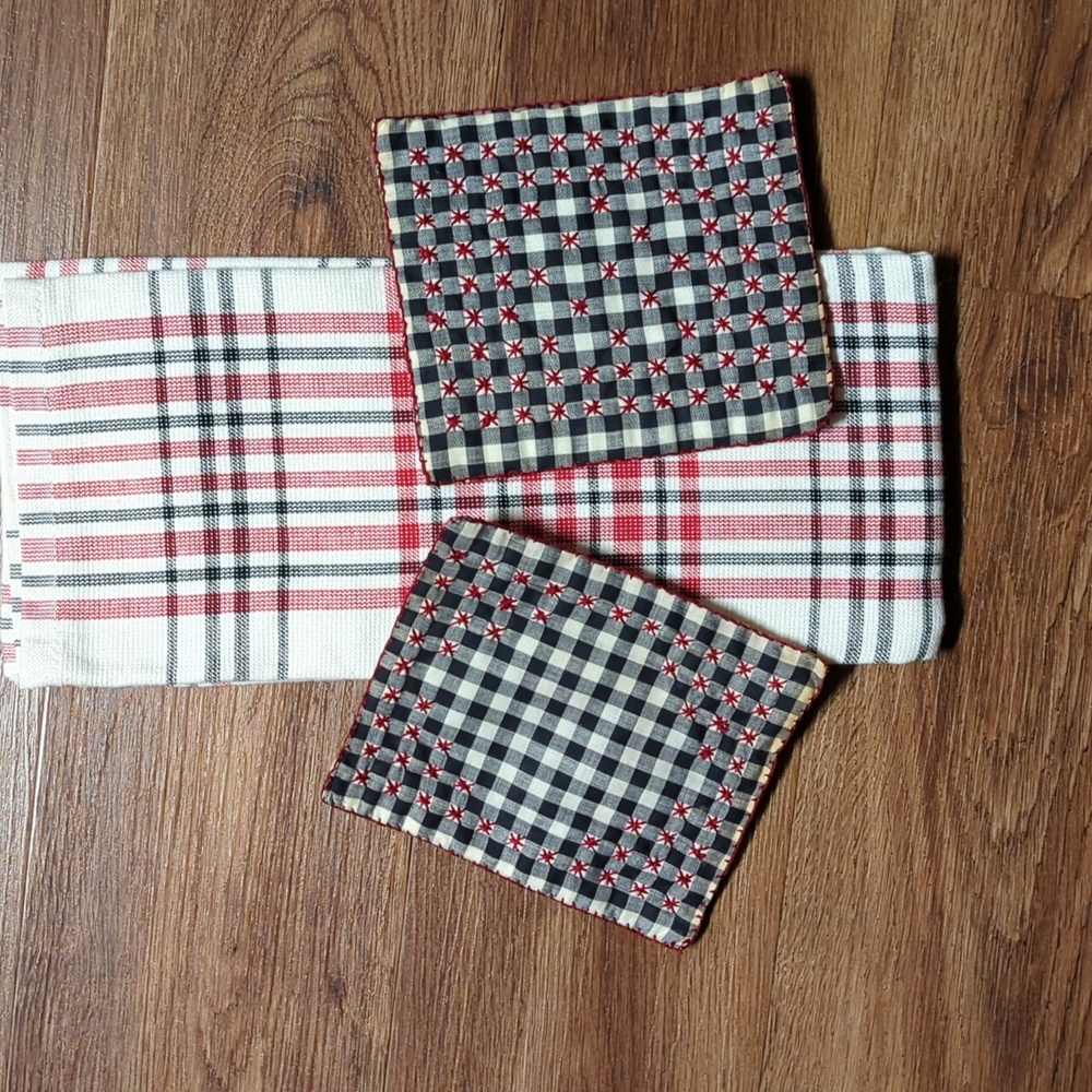 Kitchen dish towel and two potholders